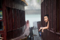 Boy in rain - Ha Long Bay Vietnam